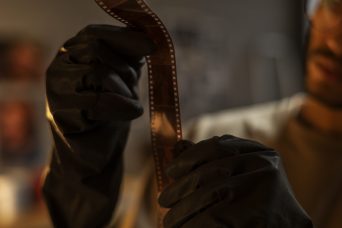 blurry-man-developing-photos-front-view